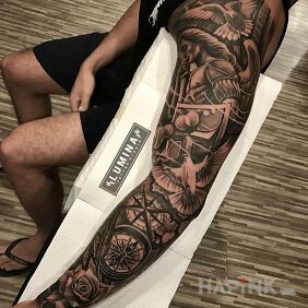 Tattoo Archangel Michael on the forearm motif: flowers style: realistic