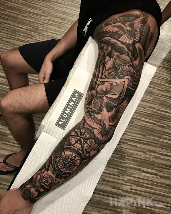 Tattoo Archanioł Michał in objects motif and realistic style on the forearm