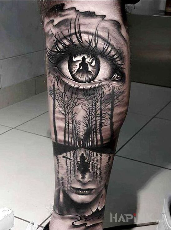 Tattoo Niesamowita wizja in black and gray motif and realistic style on the calf