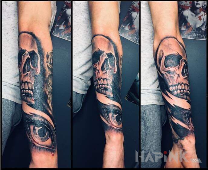 Tattoo Czacha in skulls motif and realistic style on the forearm