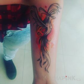 Tattoo Fenix on the forearm motif: fantasy style: Watercolor