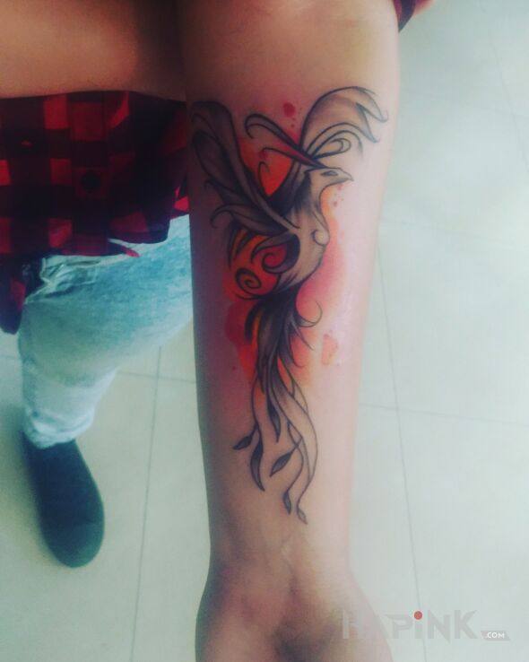 Tattoo Fenix in animals motif and Watercolor style on the forearm
