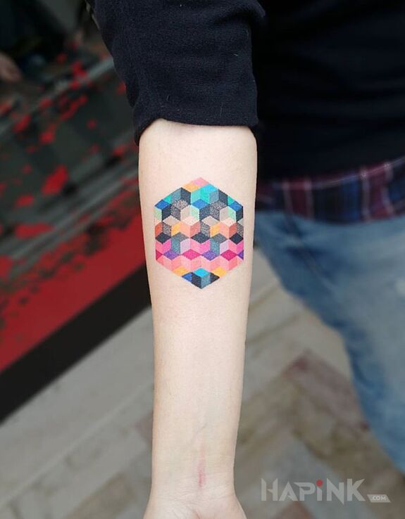 Tattoo Kwadraciki in other motif on the forearm