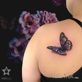 Tattoo Butterfly Tattoo on the shoulder blades motif: colorful style: realistic