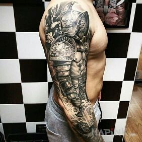 Tattoo Big-headed gladiator on the forearm motif: characters style: realistic