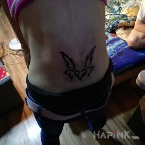 Tattoo Heart on the back motif: other style: tribal