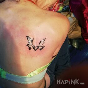 Tattoo Heart on the shoulder blades motif: other style: tribal