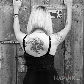 Tattoo Timeless on the back motif: black and gray style: graphic / illustrative