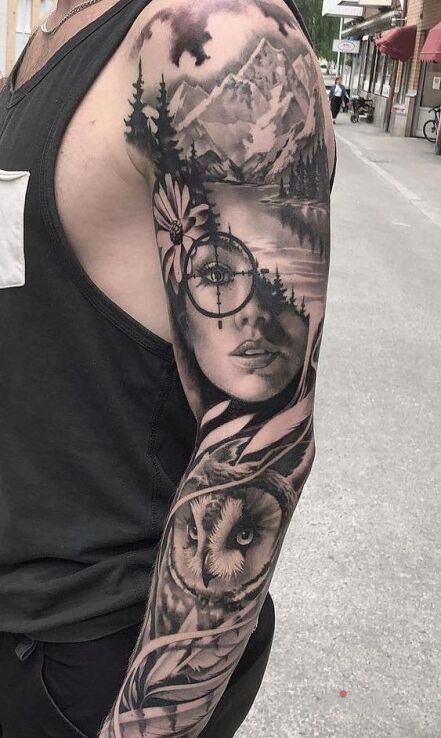 Tattoo Celownik w oku in sleeves motif and realistic style on the upper arm