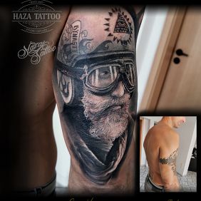 Tattoo Cover moto on the upper arm motif: cover-up style: realistic