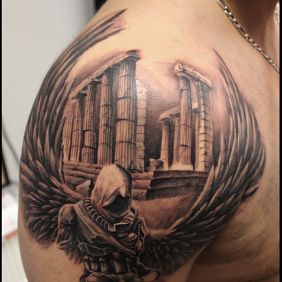 Tattoo Assassin on the upper arm motif: angels style: realistic
