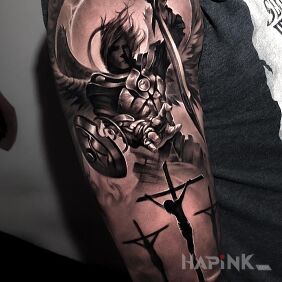 Tattoo Angel and 3 crosses on the upper arm motif: black and gray style: realistic