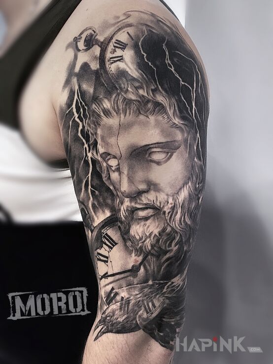 Tattoo Grecki Bóg Zeus in black and gray motif and realistic style on the upper arm