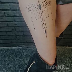 Tattoo Drops on the leg motif: ornaments