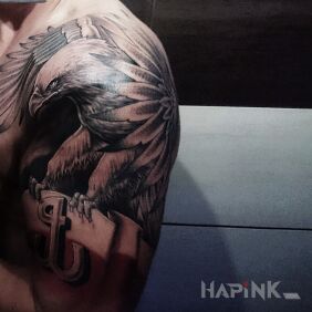 Tattoo Eagle on the forearm motif: patriotic style: realistic
