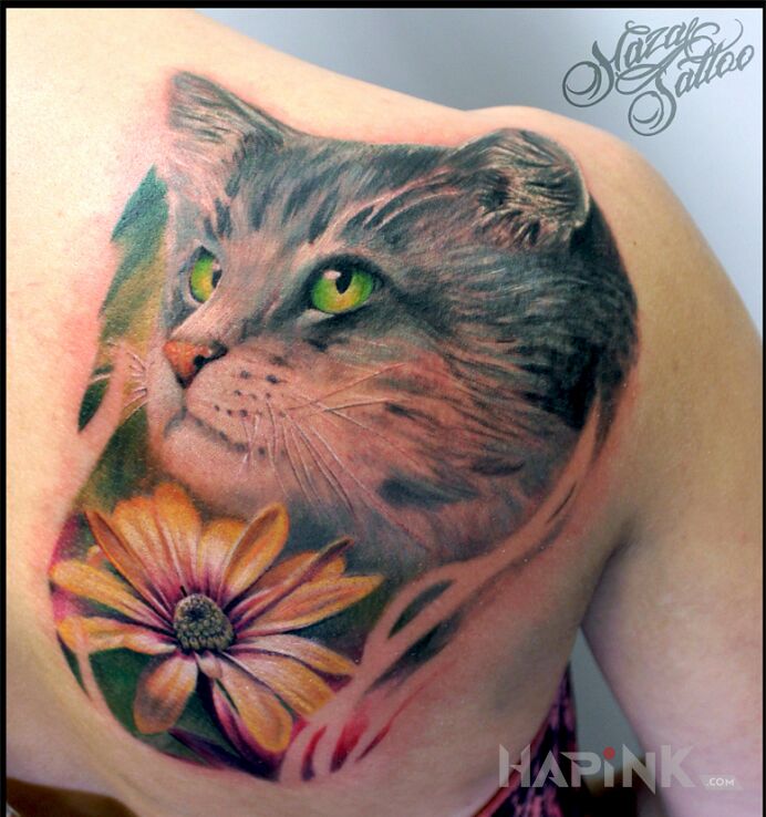 Tattoo Cat, Kitten, Pussycat in colorful motif and realistic style on the back