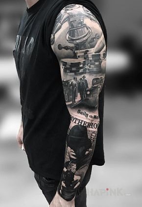 Tattoo Ruleta in black and gray motif and realistic style on the forearm