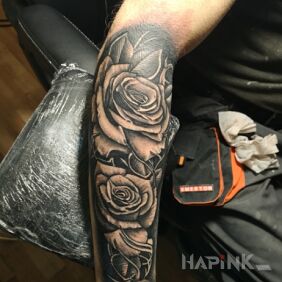 Tattoo C.D.N Nastapil on the forearm motif: flowers style: realistic