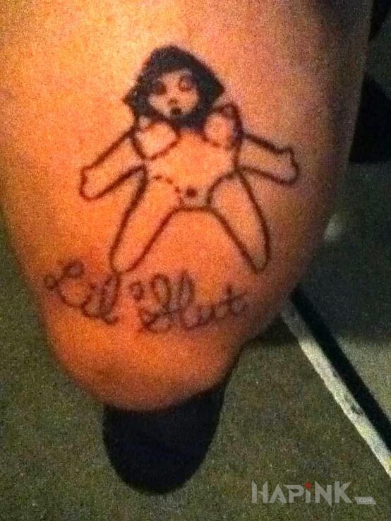 Tattoo Lil Slut in other motif on the leg