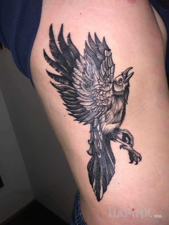 Tattoo Kruk in black and gray motif and graphic / illustrative style on the ribs