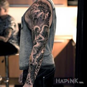 Tattoo Nice angel on the upper arm motif: 3D style: realistic