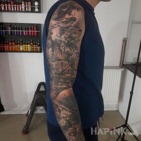 Tattoo Patriotic on the upper arm motif: war style: realistic