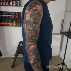 Tatuaż Patriotyczny na przedramieniu motyw: czarno-szare styl: realistyczne