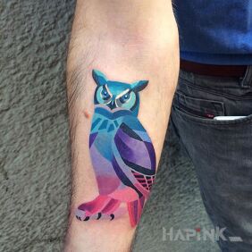 Tattoo Rainbow owl on the forearm motif: animals