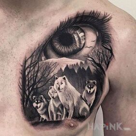 Tattoo Familia of the wolves on the chest motif: black and gray style: realistic