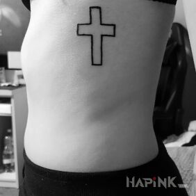 Tattoo Cross on the ribs motif: religious style: contour / linework