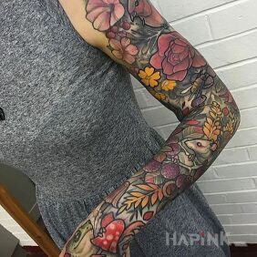 Tattoo Drawing on the upper arm motif: flowers style: neo-traditional