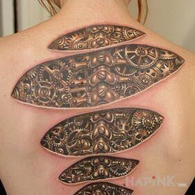 Tattoo Wheels and sprockets on the back motif: 3D style: biomechanics