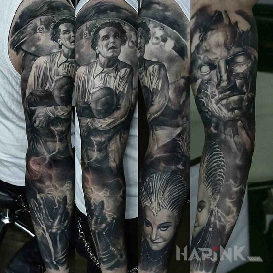 Tattoo Praca inspirowana filmem in black and gray motif and realistic style on the forearm