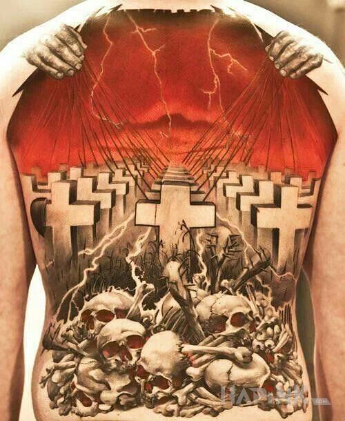 Tattoo Las krzyży in skulls motif and realistic style on the back