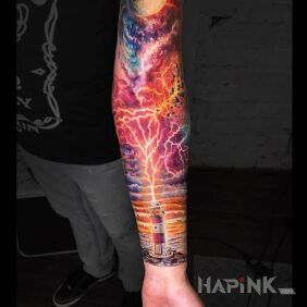 Tattoo Colorful cosmos on the upper arm motif: colorful style: realistic