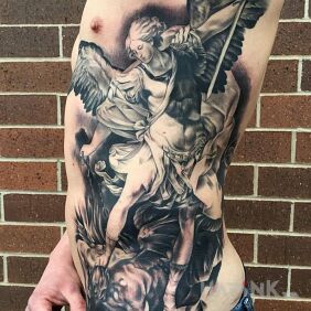 Tattoo St. Michael on the ribs motif: religious