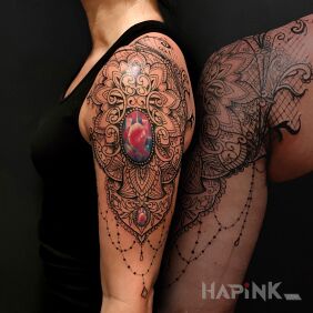 Tattoo Mandala on the upper arm motif: ornaments style: graphic / illustrative