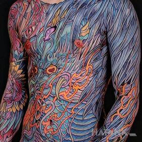 Tattoo Colorful to the max on the forearm motif: Stained glass style: newschool