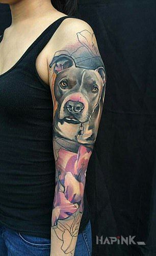 Tattoo Śliczny amstaff in colorful motif and realistic style on the forearm