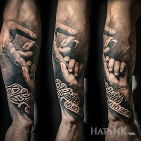 Tattoo Souvenir on the forearm motif: black and gray style: realistic