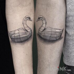Tattoo Two swans on the forearm motif: animals style: graphic / illustrative