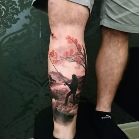 Tattoo Fisherman on the leg motif: black and gray style: realistic