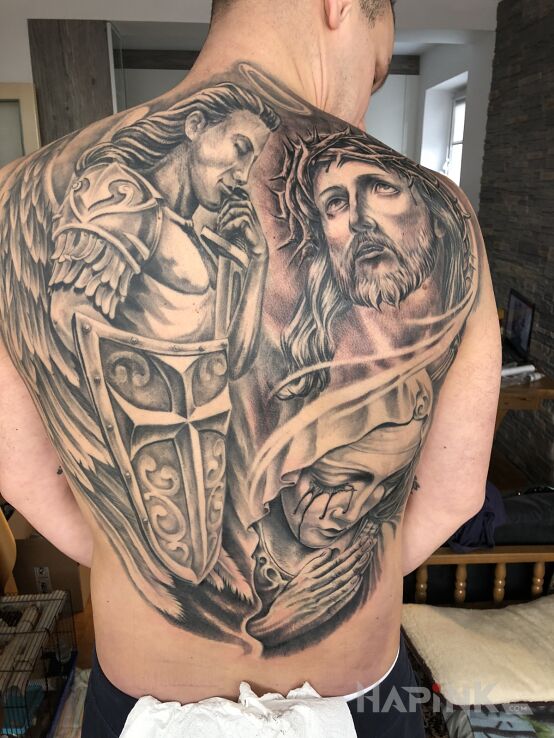Tattoo Moja święta trójca in religious motif and realistic style on the shoulder blades
