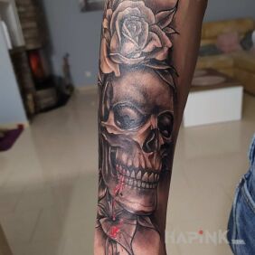 Tattoo Skull & rose on the forearm motif: skulls style: realistic