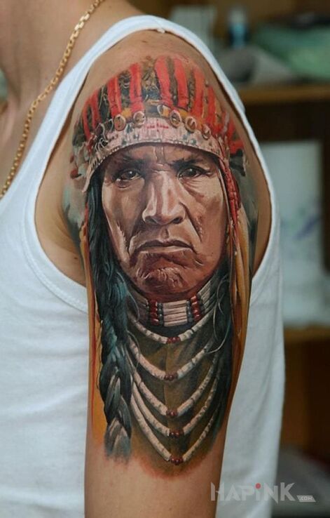 Tattoo Indianin in Indian motif on the upper arm