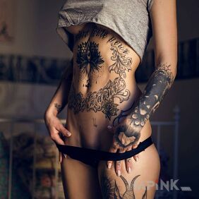 Tattoo Beautiful body on the stomach motif: flowers style: blackwork / blackout