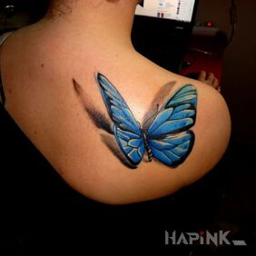 Tattoo Butterfly on the shoulder blades motif: colorful