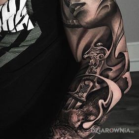 Tatuaż Podenerwowany wilk na przedramieniu motyw: zwierzęta styl: realistyczne