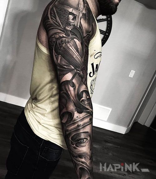 Tattoo Martwy rycerz in black and gray motif and realistic style on the forearm