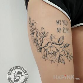 Tattoo Flowers on the leg motif: lettering style: graphic / illustrative
